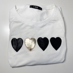 White CBR sweater with black and gold hearts